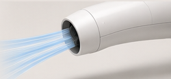 Airflow displacing water from the nozzle.